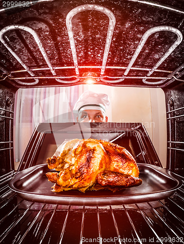 Image of Cooking chicken in the oven.