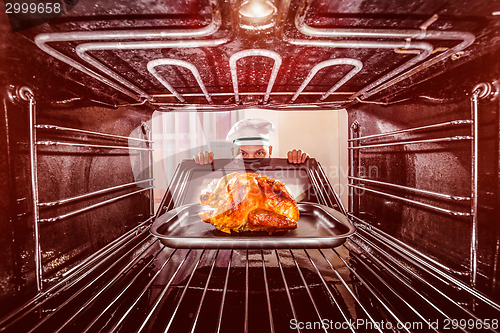 Image of Cooking chicken in the oven.