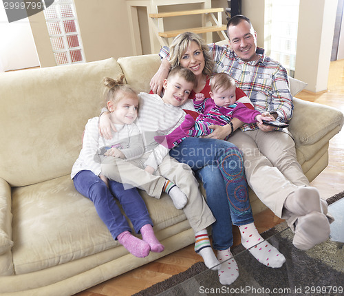 Image of happy young family at home