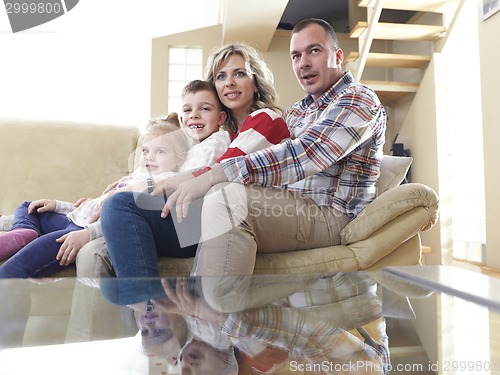 Image of happy young family at home