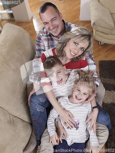 Image of happy young family at home