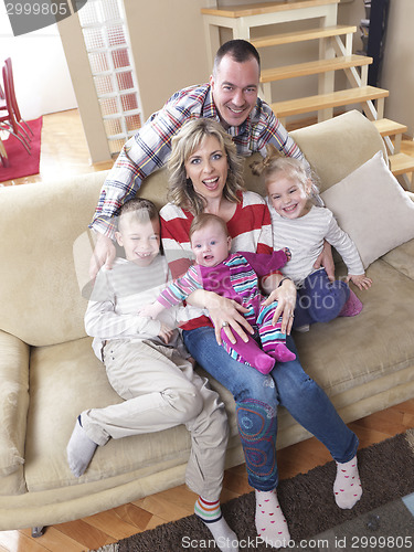 Image of happy young family at home