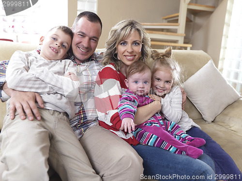 Image of happy young family at home