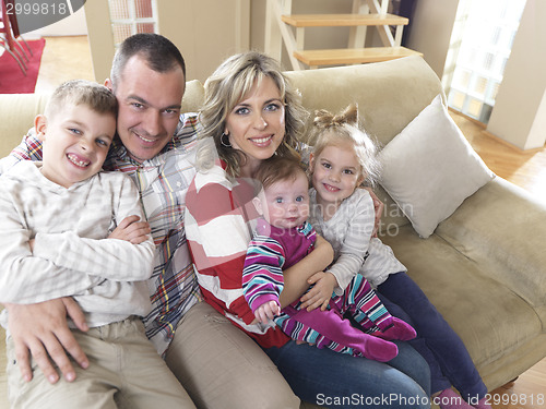 Image of happy young family at home