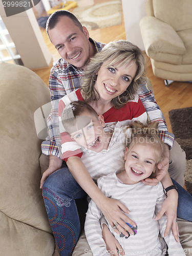 Image of happy young family at home