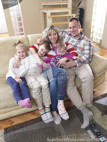 Image of happy young family at home