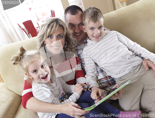 Image of happy young family at home