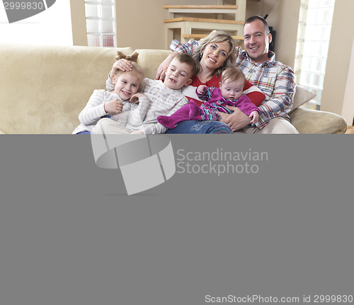 Image of happy young family at home