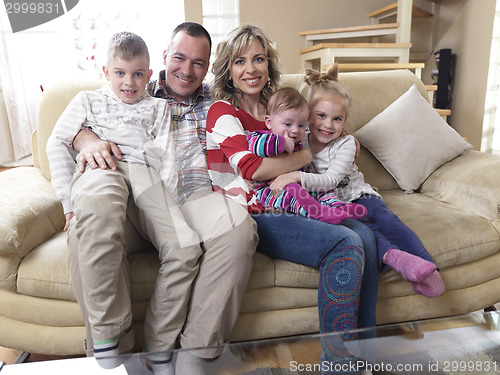 Image of happy young family at home