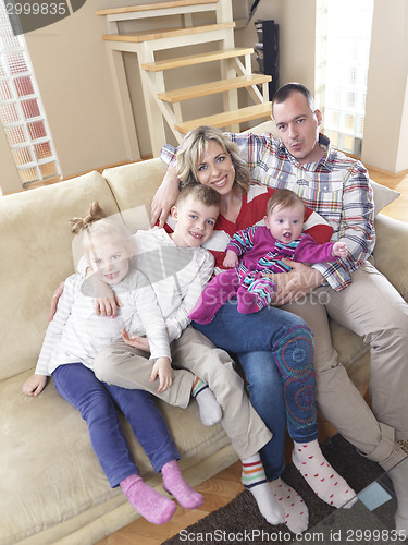 Image of happy young family at home