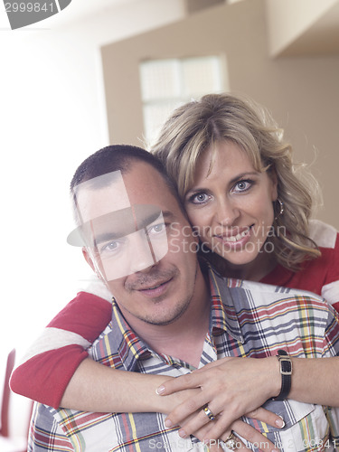 Image of happy couple at home