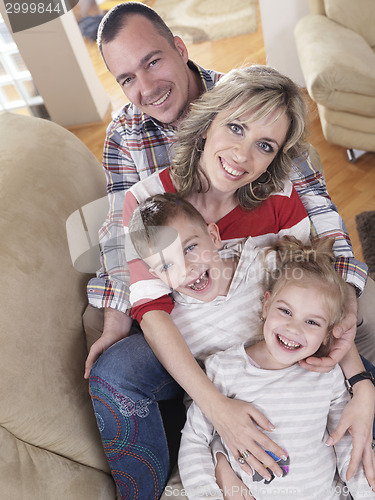 Image of happy young family at home