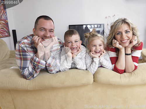 Image of happy young family at home