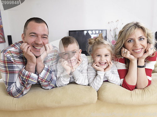 Image of happy young family at home