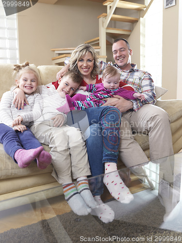 Image of happy young family at home