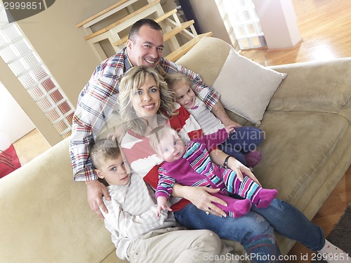 Image of happy young family at home