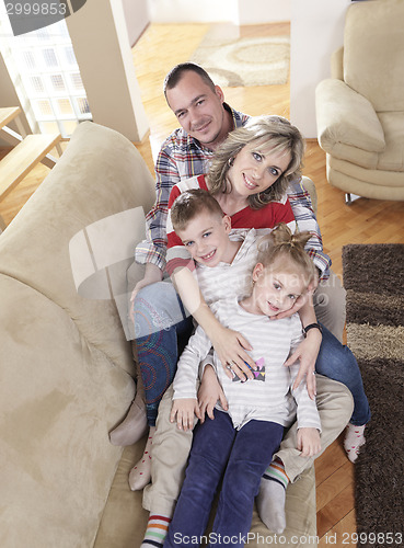 Image of happy young family at home