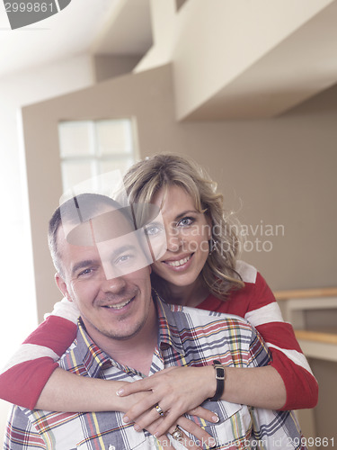 Image of happy couple at home