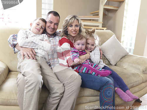 Image of happy young family at home