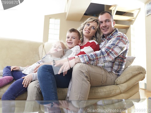 Image of happy young family at home