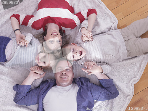 Image of happy young family at home