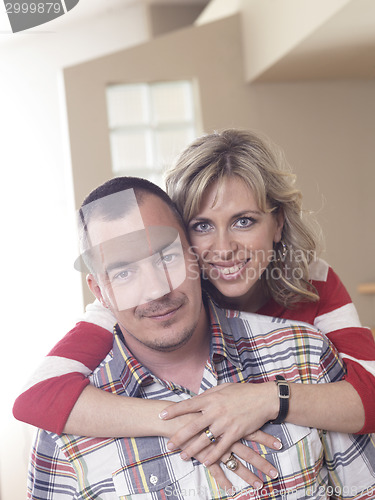 Image of happy couple at home