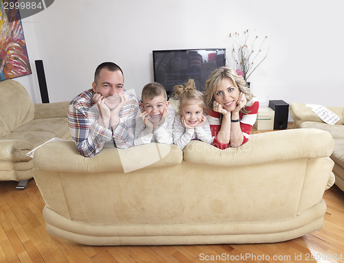 Image of happy young family at home