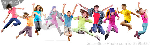 Image of Team of sportive kids friends with dumbbells and ball