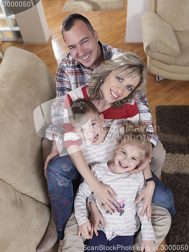 Image of happy young family at home