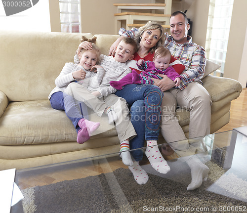 Image of happy young family at home