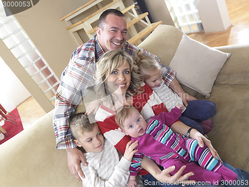 Image of happy young family at home