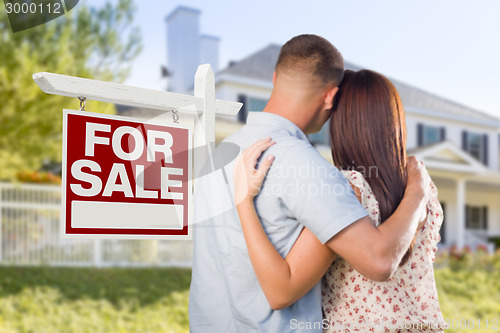 Image of For Sale Real Estate Sign, Military Couple Looking at House