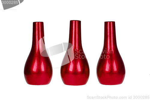 Image of Three bright red vases isolated