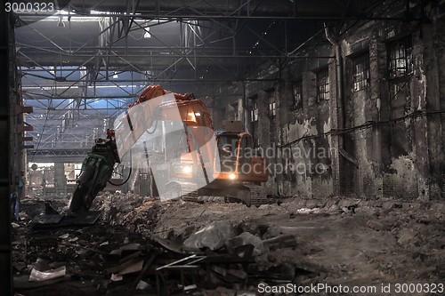 Image of Industrial interior with bulldozer inside