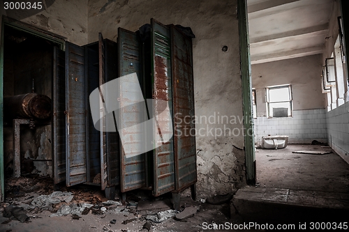 Image of Dark room with steel lockers