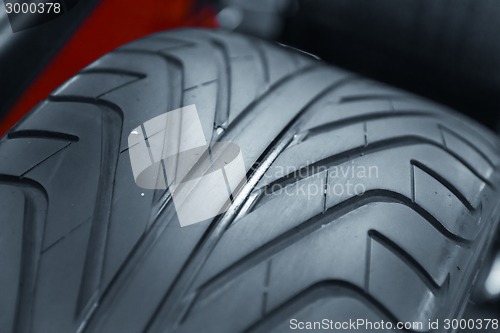 Image of New car tyre closeup photo