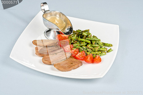 Image of tongue with grilled vegetable