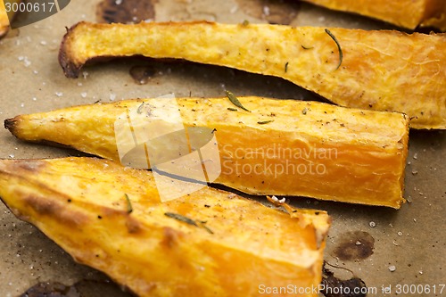 Image of Portion of fresh baked sweet potato wedges