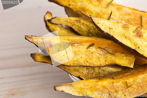 Image of Portion of fresh baked sweet potato wedges