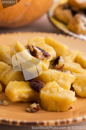 Image of homemade pumpkin gnocchi with pecan nuts