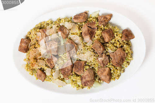 Image of Beef with frikeh serving bowl from above