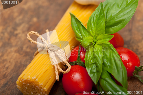 Image of Italian spaghetti pasta tomato and basil