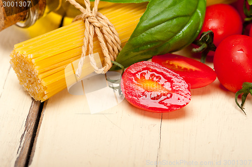 Image of Italian spaghetti pasta tomato and basil