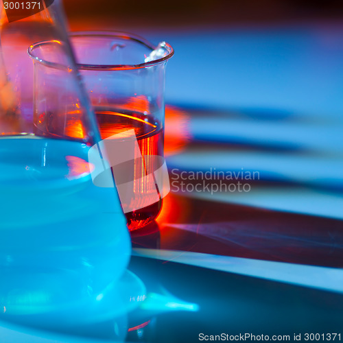 Image of Backlit laboratory flask.