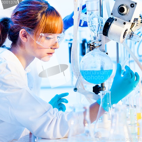 Image of Young chemist in the laboratory.