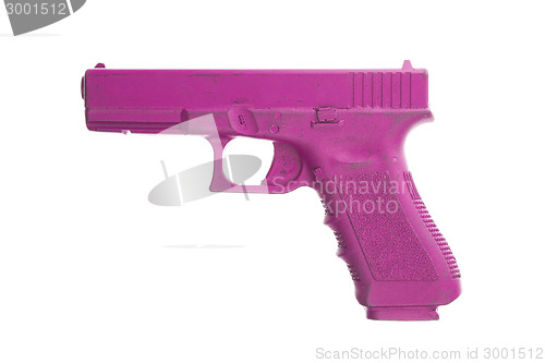 Image of Dirty pink training gun isolated on white