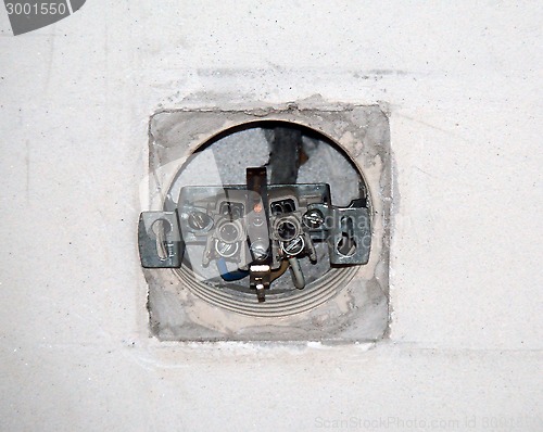 Image of Dismantled socket on the wall