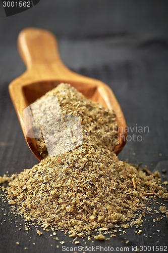 Image of Wooden scoop with spices