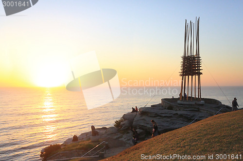 Image of Sunrise Bondi beach and Save Our Souls sculpture