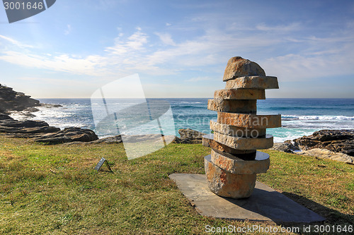 Image of Figure in Landscape basalt sculpture